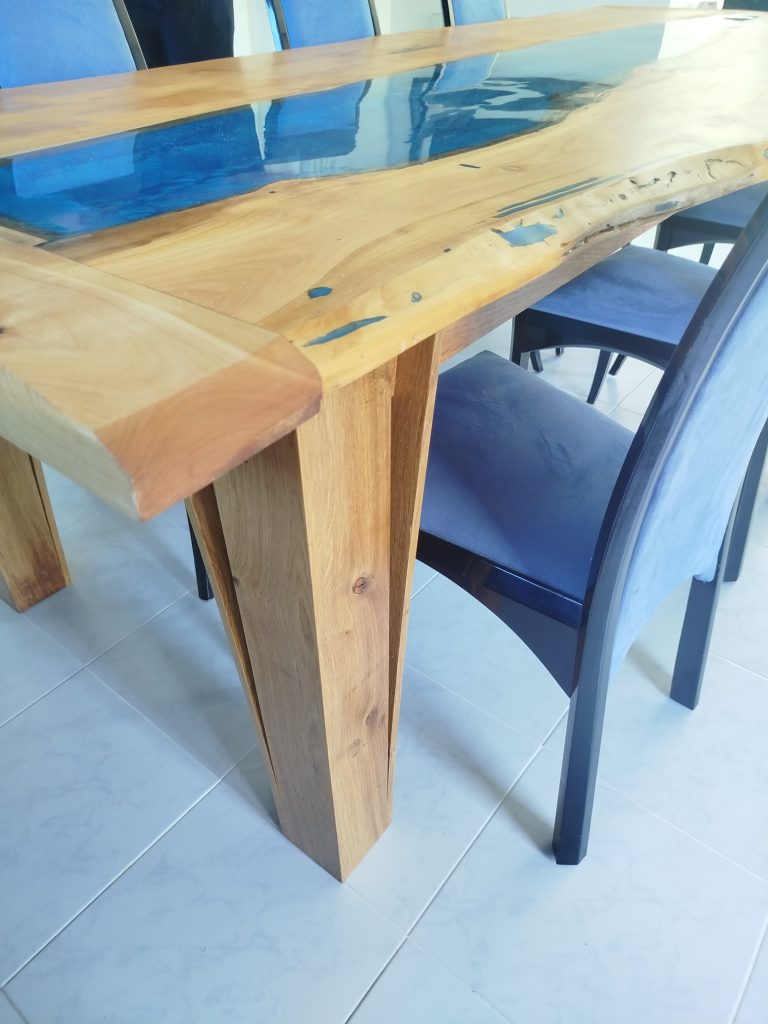 Cherry table with solid Oak base a blue and black rasin running through table measures 260cm x 100cm